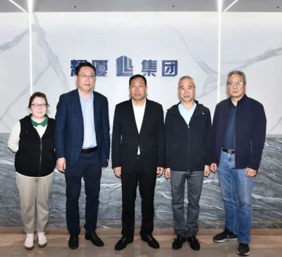 杭州市工商聯副主席吳隆一行走訪李國光會長單位—浙江耀廈控股集